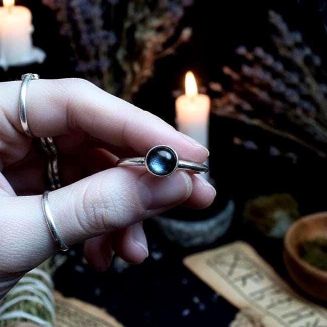 Black Moonstone Ring - Hand holding
