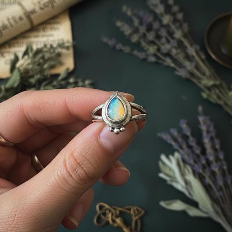 Opal Teardrop Ring - Hand holding
