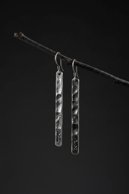 Rune bar earrings hanging on twig studio